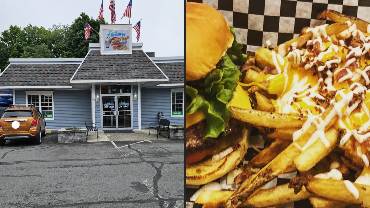 Fresh burgers and fries on a casual restaurant table.
